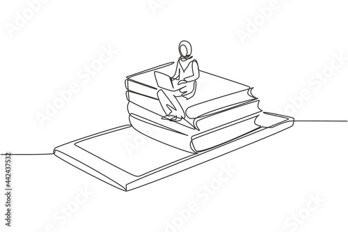 Single continuous line drawing hijab female college student sitting on pile of books while typing on laptop on smartphone. Learning online. Dynamic one line draw graphic design vector illustration
