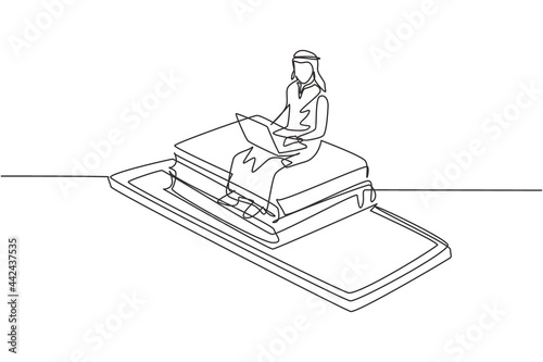 Single one line drawing Arabian male college student sitting on pile of books while typing on laptop on smartphone. Learning online education. Continuous line draw design graphic vector illustration