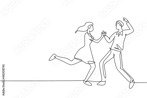 Continuous one line drawing happy couple man and woman performing dance at school, studio, party. Male and female characters dancing tango together. Single line draw design vector graphic illustration