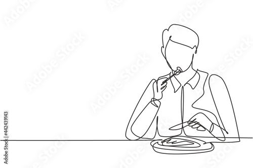 Continuous one line drawing young man having steaks meal with fork and knife around table. Enjoy lunch at restaurant. Delicious and healthy food. Single line draw design vector graphic illustration