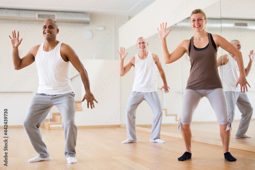 Group of multinational activity people practicing dance techniques