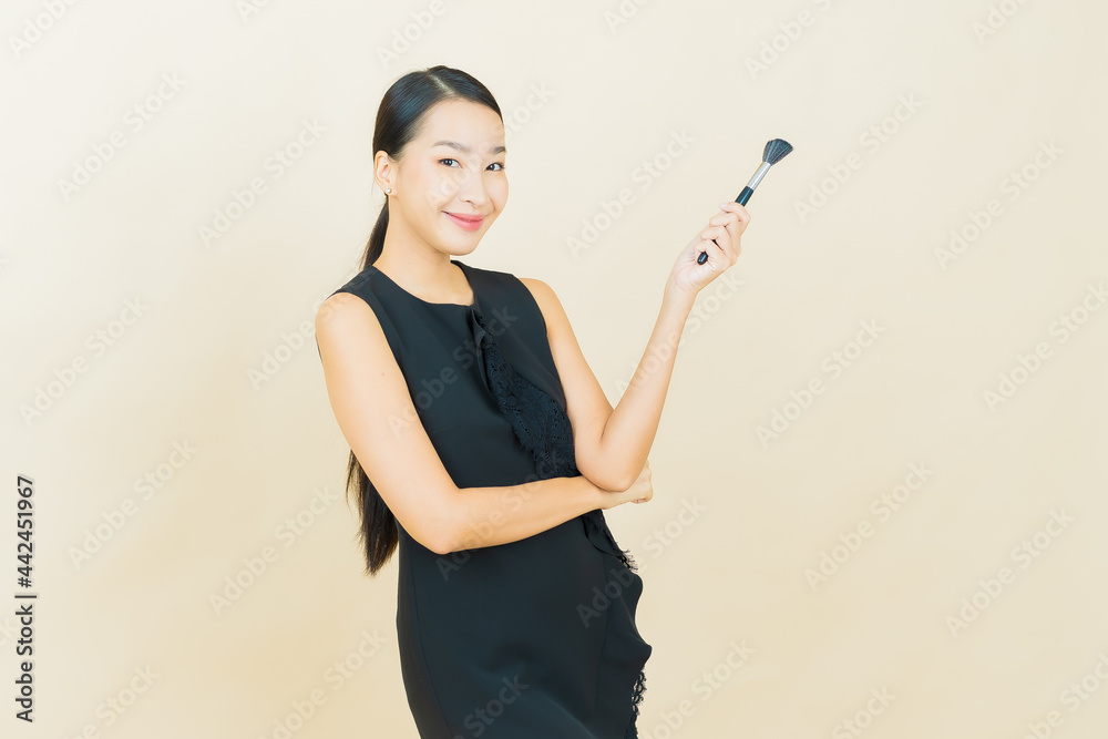 Portrait beautiful young asian woman with make up brush cosmetic Portrait beautiful young asian woman with make up brush cosmetic