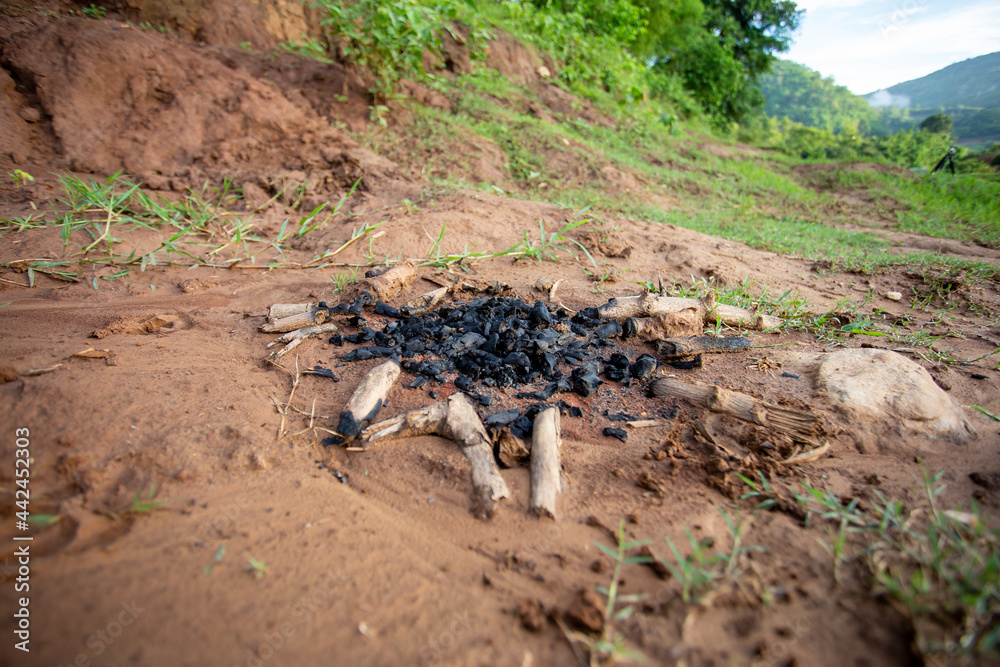 Choose focus. A pile of old charcoal after a camping fire. make me miss traveling Choose focus. A pile of old charcoal after a camping fire. make me miss traveling