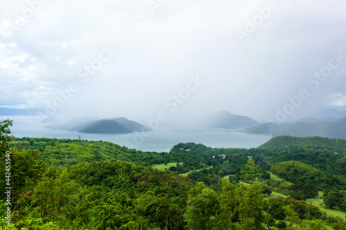 landscape view of the dam in rainy season with cloud  