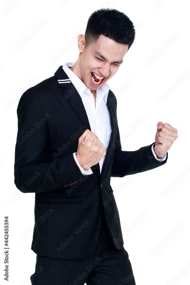 interesting cutout portrait of smart young healthy businessman on black suit standing with clenched fists and shout out loud as satisfy on great success to win competition interesting cutout portrait of smart young healthy businessman on black suit standing with clenched fists and shout out loud as satisfy on great success to win competition