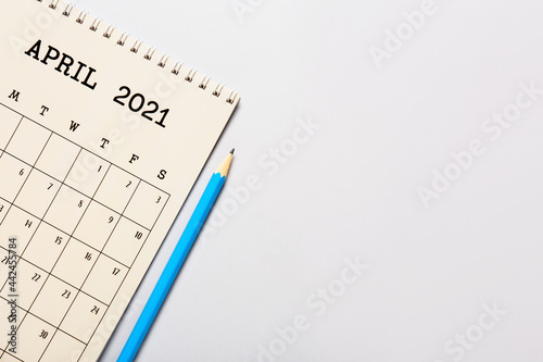 Flip paper calendar and pen...