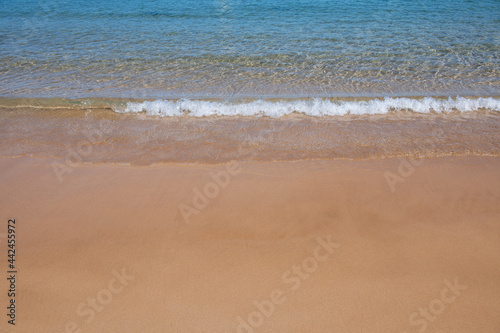 Beach and tropical sea and golden sand. Nature ocean landscape background.