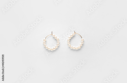 Beautiful earrings on white background