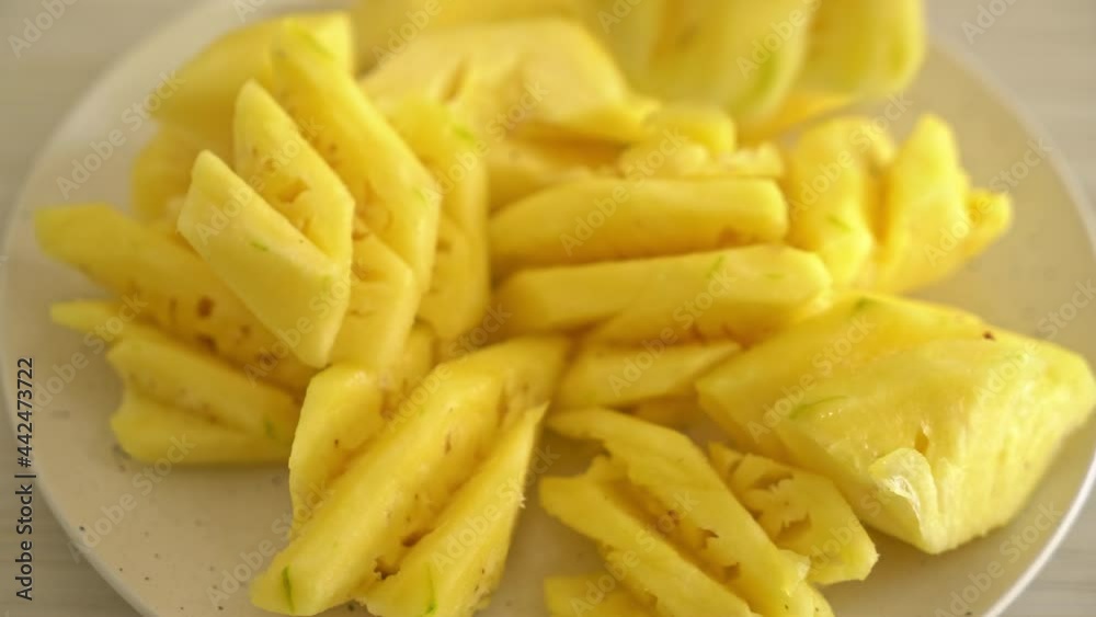 fresh pineapple sliced on plate fresh pineapple sliced on plate