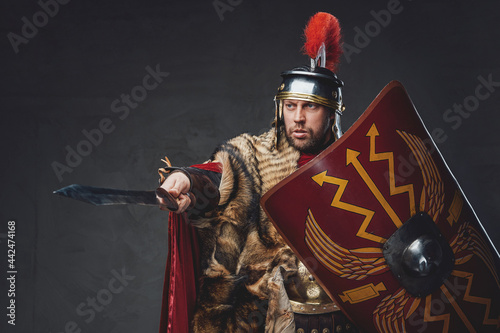 Roman general with shield pointing his sword