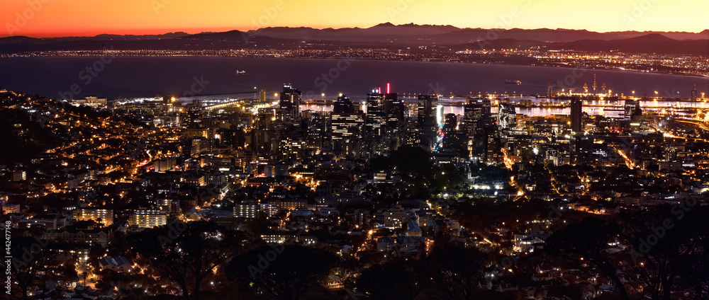 Fototapeta premium Aerial, dawn panoramic of downtown Cape Town with Table Bay in the background.