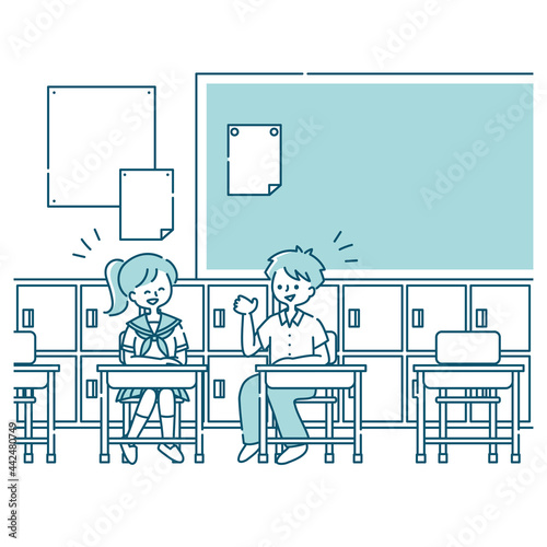 教室で楽しそうに会話する男女生徒