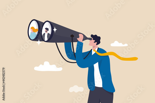 Searching for candidate, HR Human Resources find people to fill in job vacancy, finding customer or career opportunity concept, businessman HR look through binoculars to find candidate people. photo