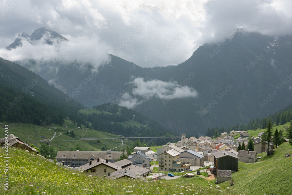 View of Simplon-dorf, a village located on the Simplon pass, the road can be seen in the background