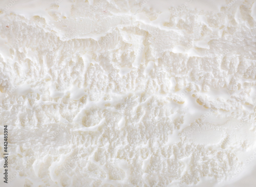 White ice cream close-up background. Top view. White ice cream close-up background. Top view.