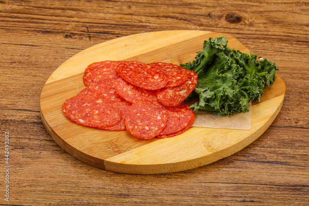 Italian spycy pepperoni sausage slices Italian spycy pepperoni sausage slices