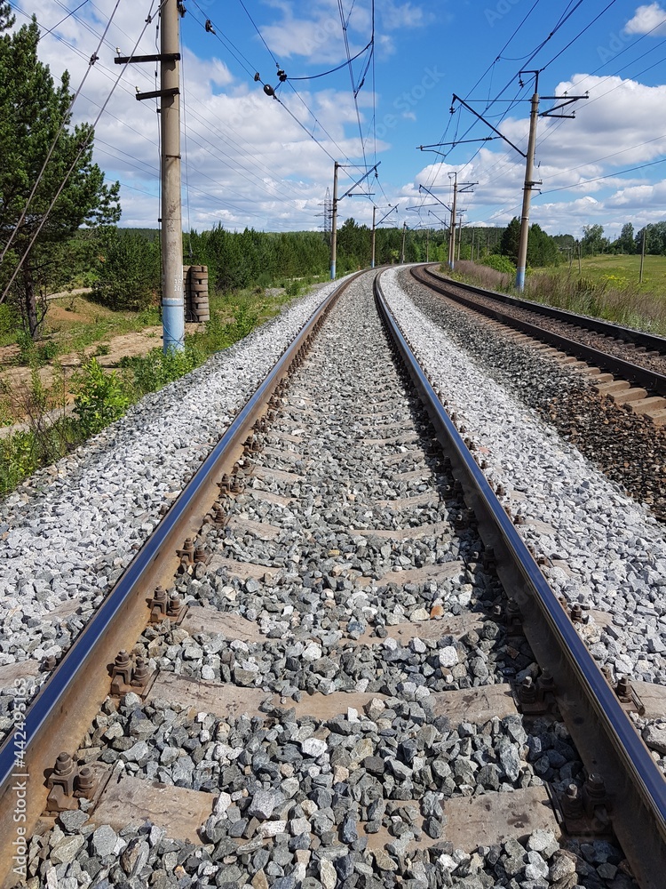 The rails of the railroad go to the horizon The rails of the railroad go to the horizon