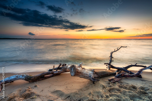 A beautiful sunset on the beach of the Sobieszewo Island at the Baltic Sea. Poland