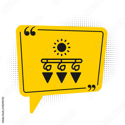 Black Drying grapes icon isolated on white background. Dried grapes. Yellow speech bubble symbol. Vector