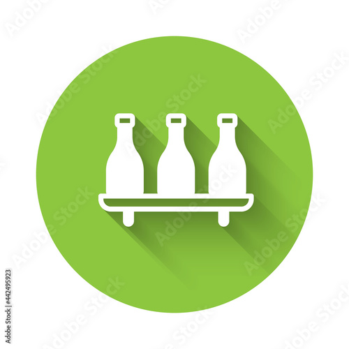 White Bottle of wine icon isolated with long shadow background. Wine varieties. Green circle button. Vector