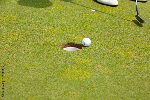 golf ball on hole