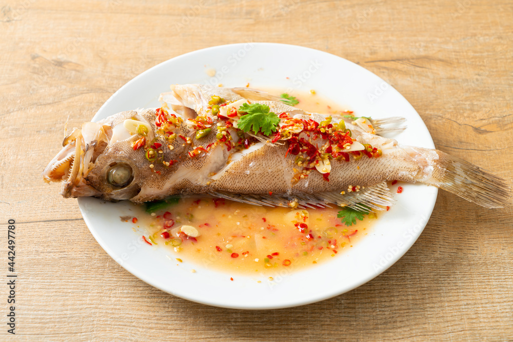 Steamed grouper fish with lime and chillies