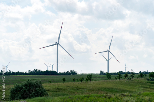 Obraz na płótnie Wind turbines for electric power production. Renewable energy for climate protection. Ecological energy composition w salonie