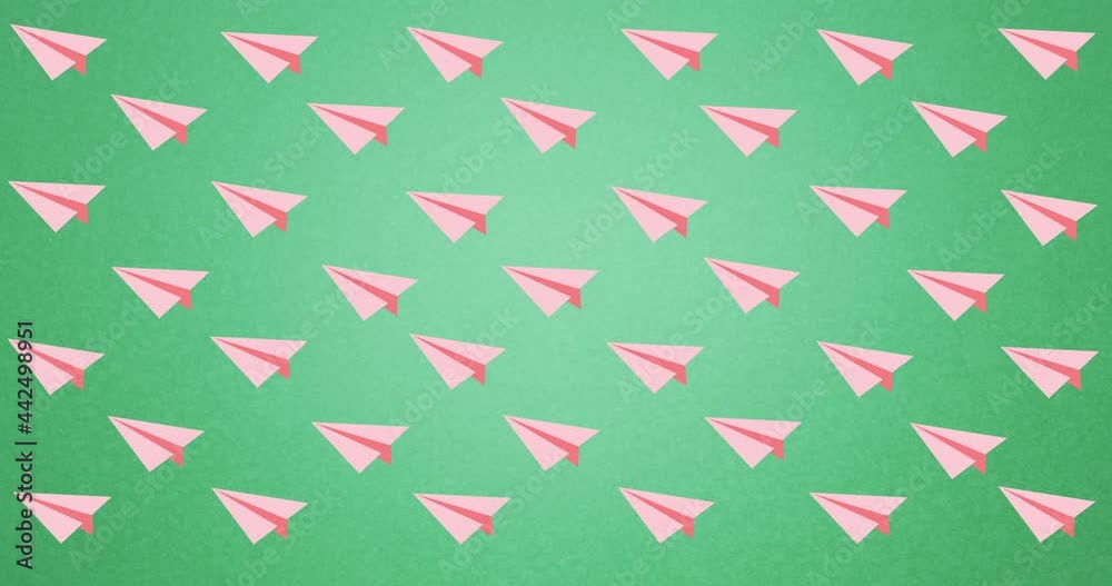 Digital animation of multiple pink paper planes icons floating against green background