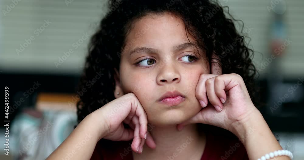 Little girl thinking about solution