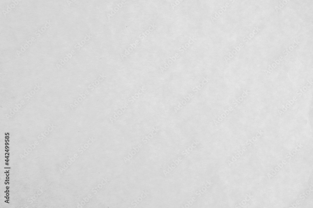 White cardboard paper look like white concrete or cement wall. Background texture christmas festival, copy space for text. White cardboard paper look like white concrete or cement wall. Background texture christmas festival, copy space for text.