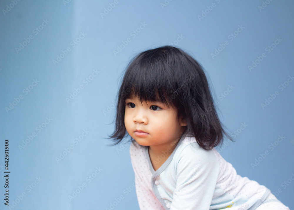 A headshot portrait of a cheerful baby Asian woman, a cute toddler little girl with adorable bangs hair, a child smiling and pose for don't looking to the camera. A headshot portrait of a cheerful baby Asian woman, a cute toddler little girl with adorable bangs hair, a child smiling and pose for don't looking to the camera.