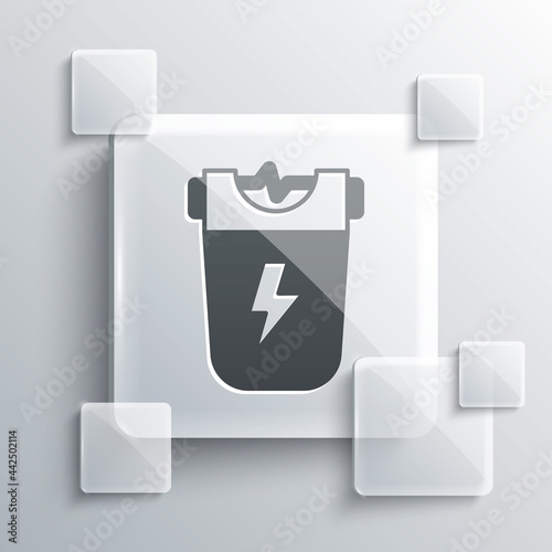 Grey Police electric shocker icon isolated on grey background. Shocker for protection. Taser is an electric weapon. Square glass panels. Vector