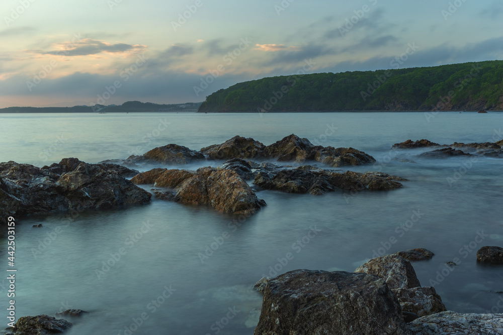 Rocks in the water on the seashore. Summer. Rocks in the water on the seashore. Summer.