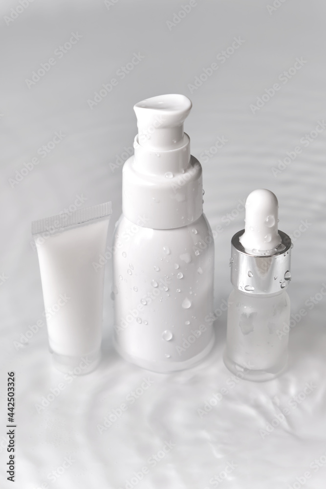 cosmetic bottle cream packaging product on white water background cosmetic bottle cream packaging product on white water background