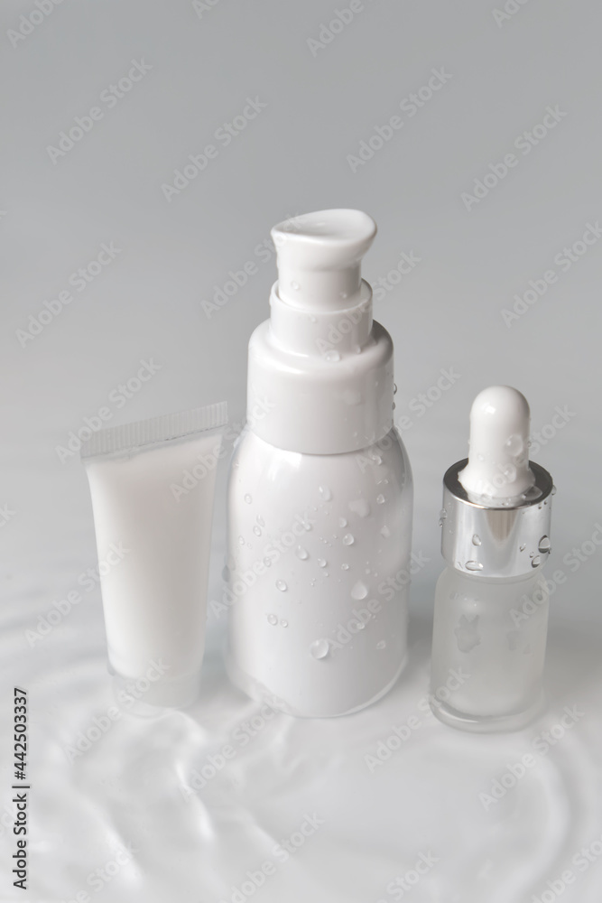 cosmetic bottle cream packaging product on white water background cosmetic bottle cream packaging product on white water background