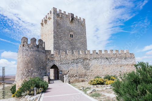 Shot from a low angle of the castle of Tiedra built in the 11th century. Castle visited by el Cid photo