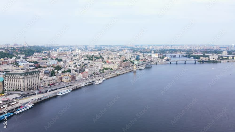 Aerial view of yacht, catamarans and boats parked on a pier overlooking the city Aerial view of yacht, catamarans and boats parked on a pier overlooking the city