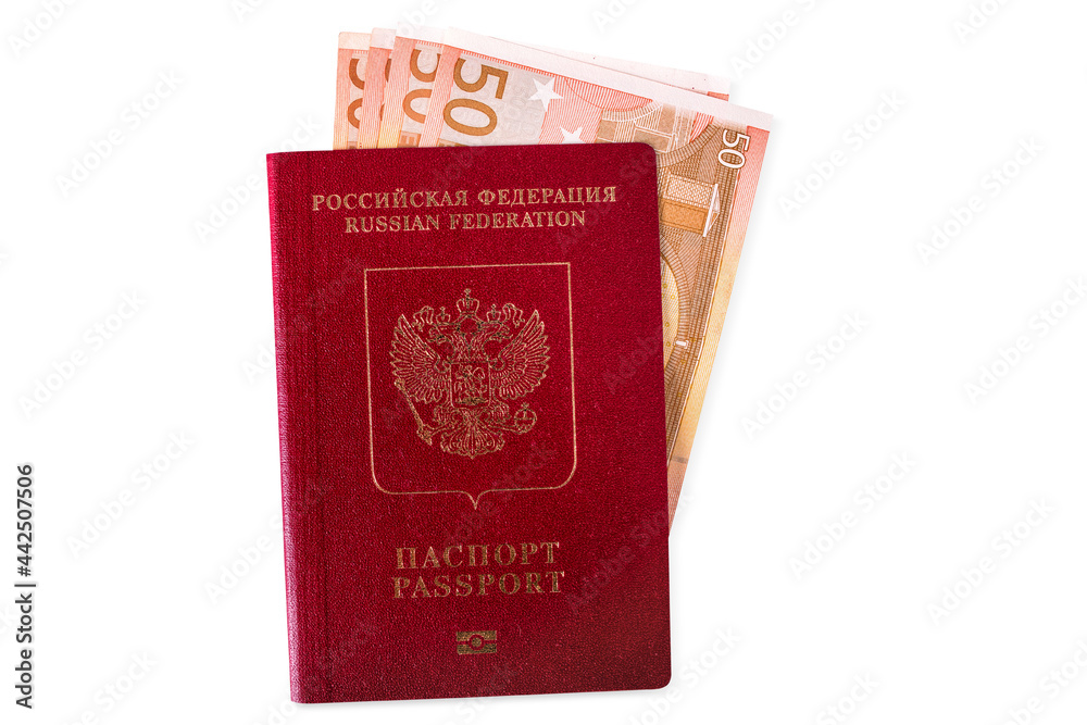 A red Russian passport for travelling and going abroad with a bunch of euros banknotes inside, isolated. A red Russian passport for travelling and going abroad with a bunch of euros banknotes inside, isolated.