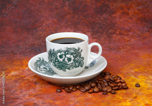 cup of coffee with beans-Traditional Kopi O commonly served in Malaysia and Singapore.