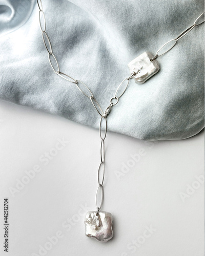 pearl silver necklace on white