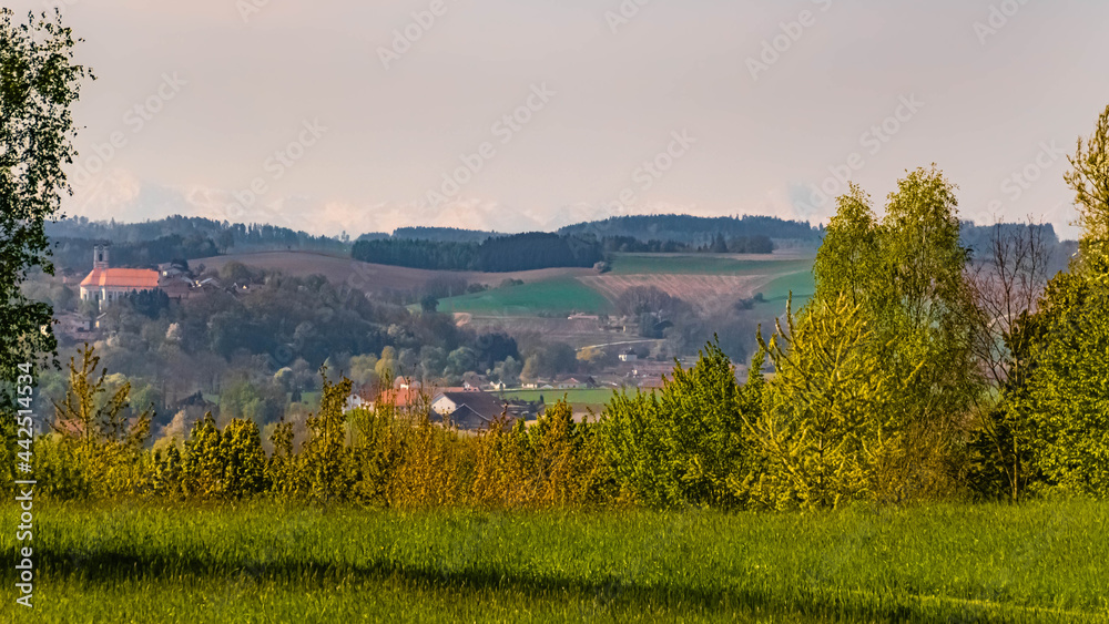 Beautiful spring view with a hazy far view of the alps at Bad Griesbach Therme, Bavaria, Germany