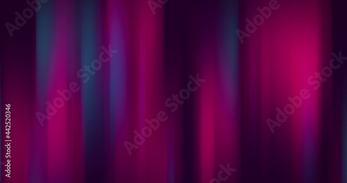 Digital image of green and purple light trails moving against black background
