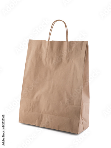 Shopping recycled brown paper bag isolated on white background with clipping path