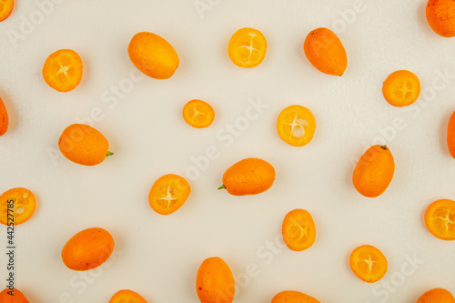 top view of fresh ripe kumquat fruits isolated on white background