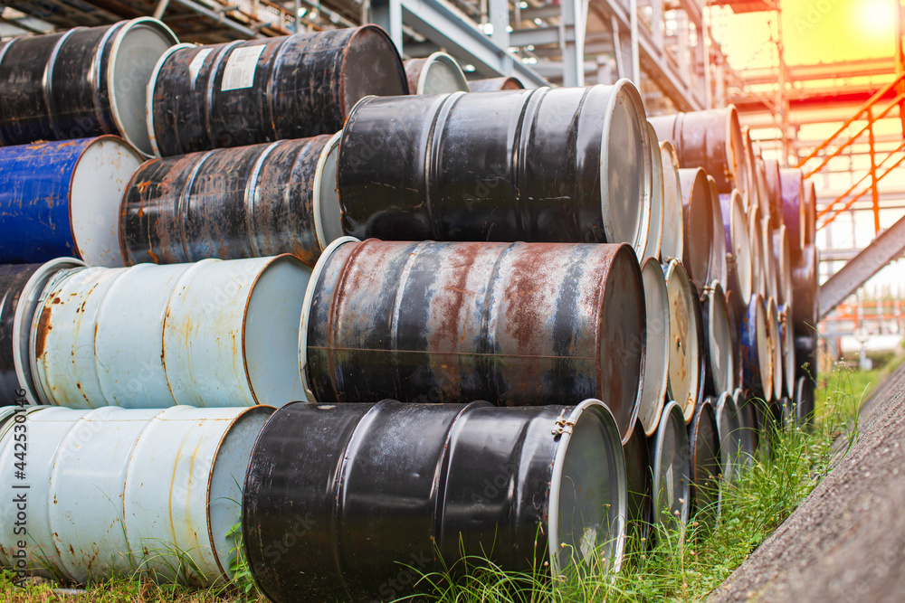 Oil barrels blue or chemical drums horizontal stacked up