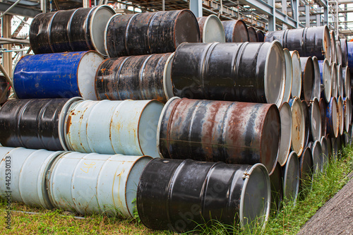 Oil barrels blue or chemical drums horizontal stacked up