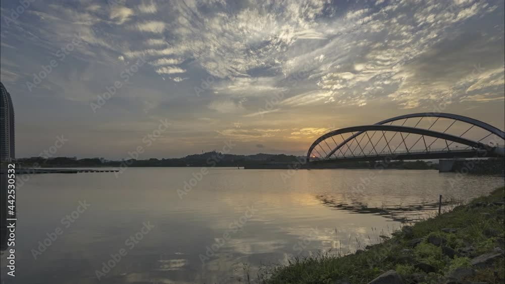 timelapse of a calm view at the putrajaya dam in  the morning 