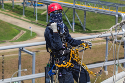 Male worker rope access inspection