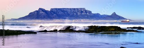 Twilight panoramic of Table Mountain in Cape Town as viewed from Bloubergstrand, South Africa.