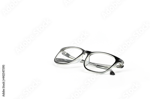 Black glasses with clear lenses isolated on white background